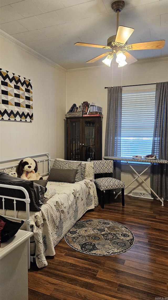 620 W 3rd St, Rector, AR 72461 - bedroom with ornamental molding, wood finished floors, and a ceiling fan