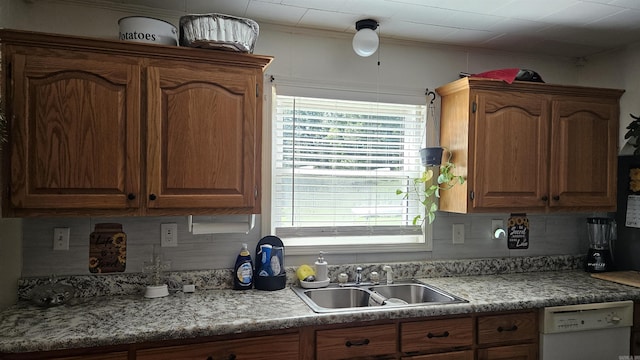 620 W 3rd St, Rector, AR 72461 - kitchen featuring dishwasher, a sink, tasteful backsplash, and plenty of natural light