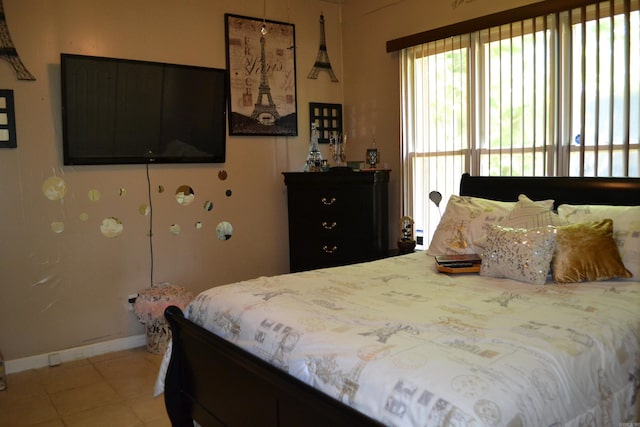423 W Saint Louis St, Hot Springs, AR 71913 - bedroom featuring light tile patterned floors and baseboards