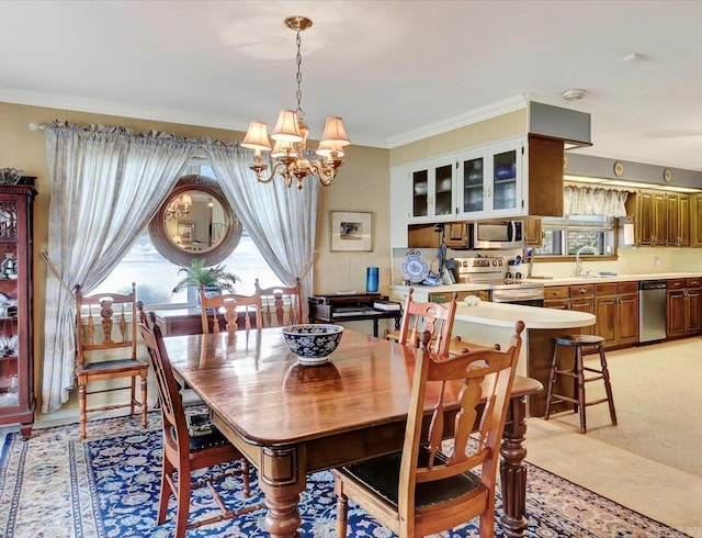 190 Woodlore Pt, Hot Springs, AR 71913 - dining room featuring a chandelier, plenty of natural light, ornamental molding, and light carpet