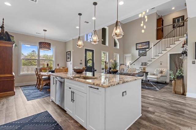 6020 Centark Ct, Alexander, AR 72002 - kitchen featuring a sink, stainless steel dishwasher, baseboards, white cabinetry, and recessed lighting