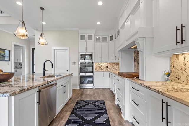 6020 Centark Ct, Alexander, AR 72002 - kitchen with appliances with stainless steel finishes, a sink, white cabinetry, dark wood-type flooring, and glass insert cabinets