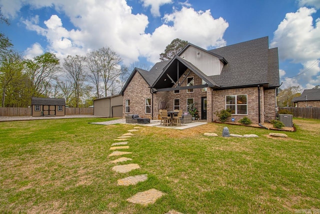 6020 Centark Ct, Alexander, AR 72002 - back of property with brick siding, a shingled roof, a patio area, and central air condition unit