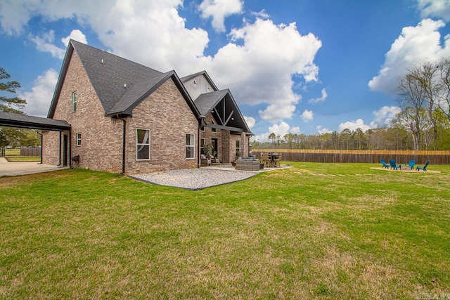 6020 Centark Ct, Alexander, AR 72002 - rear view of property featuring a patio area, brick siding, and a shingled roof