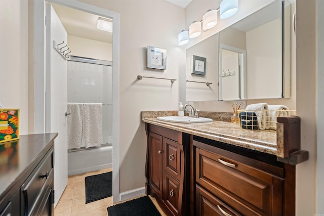 740 Weston Rd Unit 309-B, Hot Springs, AR 71913 - full bath with vanity, tile patterned floors, and  shower combination