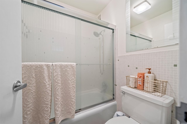 740 Weston Rd Unit 309-B, Hot Springs, AR 71913 - full bath featuring tile walls, toilet, and combined bath / shower with glass door