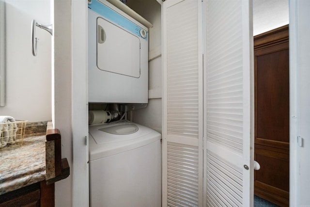 740 Weston Rd Unit 309-B, Hot Springs, AR 71913 - washroom with stacked washer / dryer