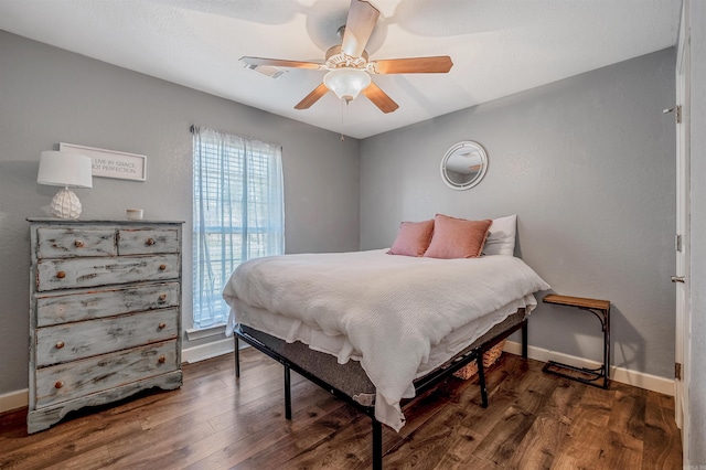 58 Eaglebrook Dr, Conway, AR 72032 - bedroom featuring wood finished floors, baseboards, and a ceiling fan