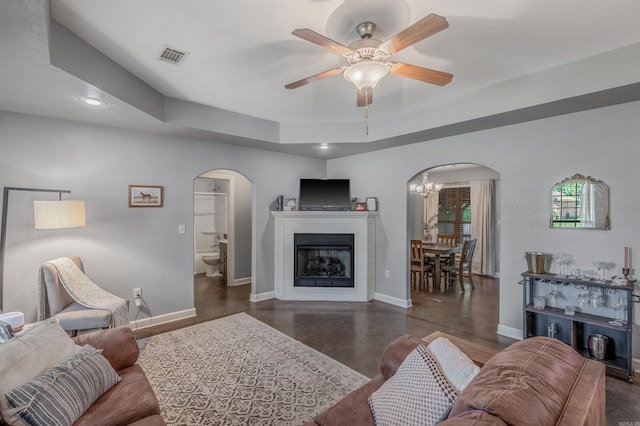 58 Eaglebrook Dr, Conway, AR 72032 - living room with arched walkways, ceiling fan, baseboards, and recessed lighting