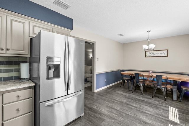 2 Timber Ridge Ct, Little Rock, AR 72211 - dining area featuring dark wood-style flooring, baseboards, a chandelier, and a textured ceiling