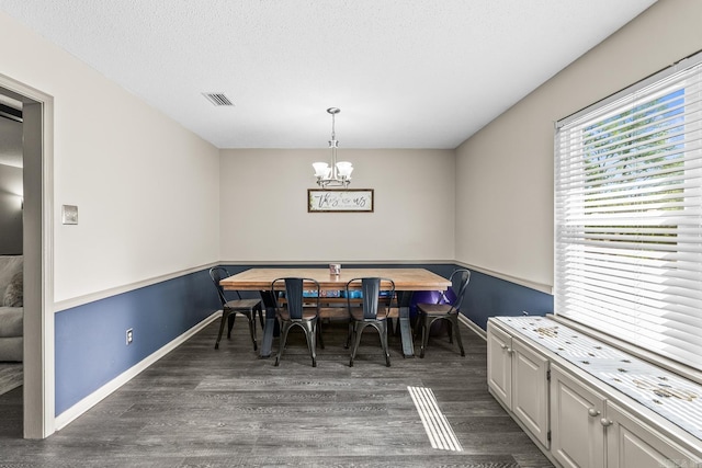 2 Timber Ridge Ct, Little Rock, AR 72211 - dining room with dark wood-type flooring, a chandelier, and baseboards
