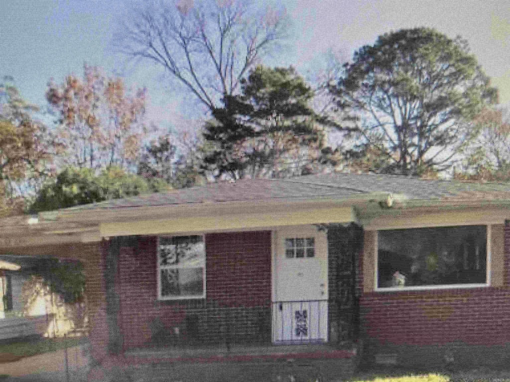 706 Walnut, North Little Rock, AR 72114 - view of front of home featuring brick siding