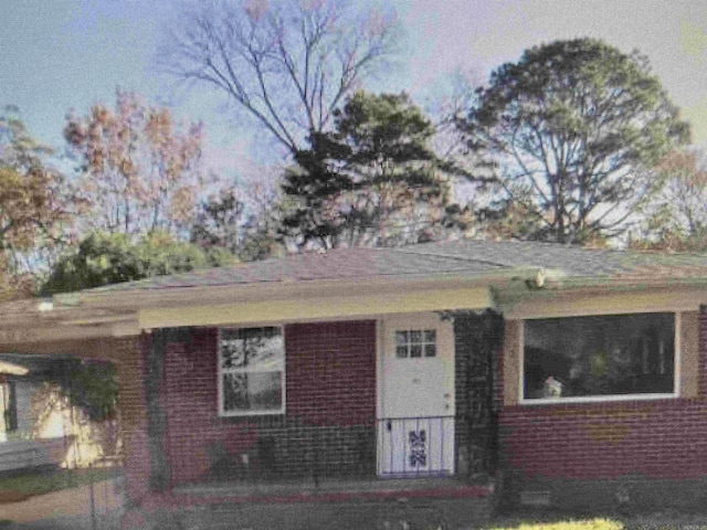 706 Walnut, North Little Rock, AR 72114 - view of front of home featuring brick siding