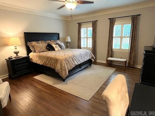 2111 Hinson Rd Unit 19, Little Rock, AR 72212 - bedroom featuring wood finished floors, crown molding, baseboards, and a ceiling fan