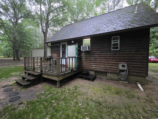249 Mud Cat Rd, Heber Springs, AR 72543 - rear view of property featuring a deck, roof with shingles, and cooling unit
