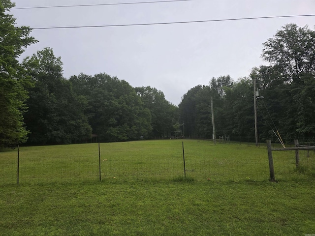 249 Mud Cat Rd, Heber Springs, AR 72543 - view of green lawn with a forest view