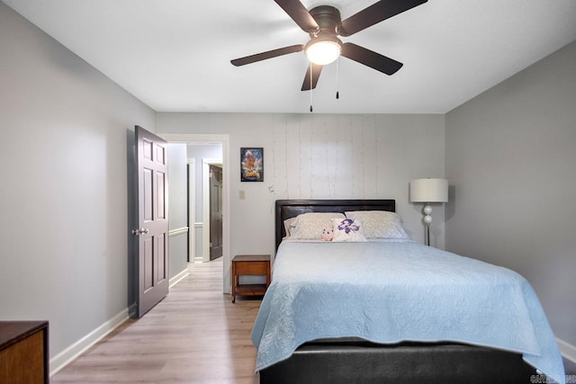 55 Laver Cir, Little Rock, AR 72210 - bedroom with light wood-type flooring, baseboards, and a ceiling fan
