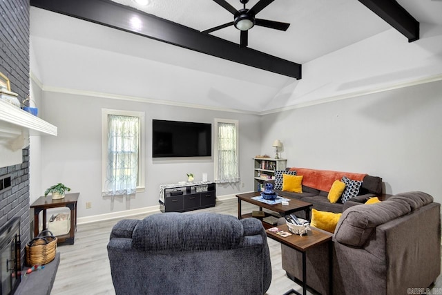 55 Laver Cir, Little Rock, AR 72210 - living room featuring a fireplace, a ceiling fan, light wood-style flooring, and plenty of natural light