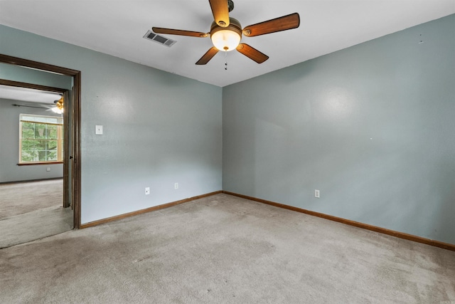 104 Heatherbrae Ct, Sherwood, AR 72120 - empty room featuring a ceiling fan, carpet flooring, and baseboards
