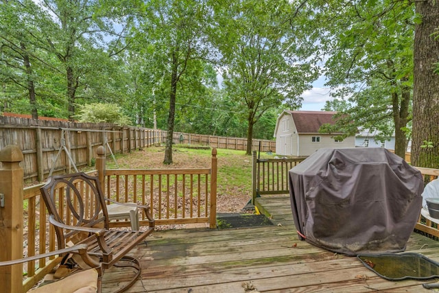 104 Heatherbrae Ct, Sherwood, AR 72120 - wooden terrace with a grill and a fenced backyard
