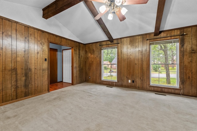 104 Heatherbrae Ct, Sherwood, AR 72120 - carpeted spare room featuring wood walls and a ceiling fan
