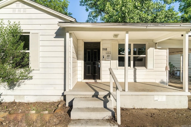 713 Hyacinth St, North Little Rock, AR 72117 - entrance to property with crawl space and covered porch