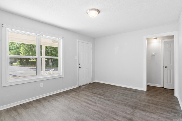 713 Hyacinth St, North Little Rock, AR 72117 - spare room featuring wood finished floors and baseboards