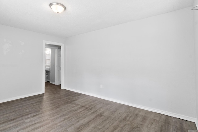 713 Hyacinth St, North Little Rock, AR 72117 - spare room with wood finished floors and baseboards