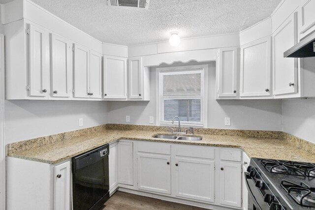 713 Hyacinth St, North Little Rock, AR 72117 - kitchen with black appliances, a sink, white cabinets, and a textured ceiling