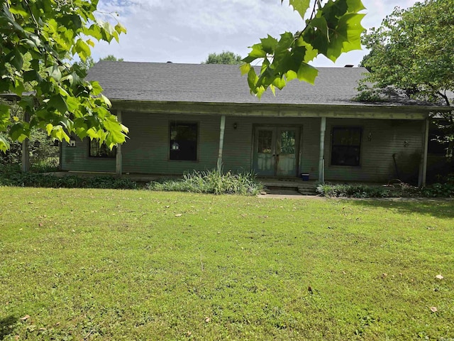 81 Harvest Ln, Austin, AR 72007 - view of front facade with a front lawn, french doors, and a porch