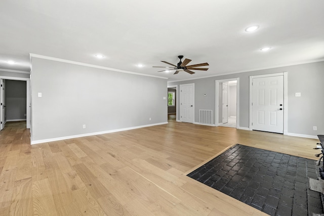 912 Bumpus Rd, Alexander, AR 72002 - unfurnished living room featuring a ceiling fan, recessed lighting, crown molding, light wood-type flooring, and baseboards