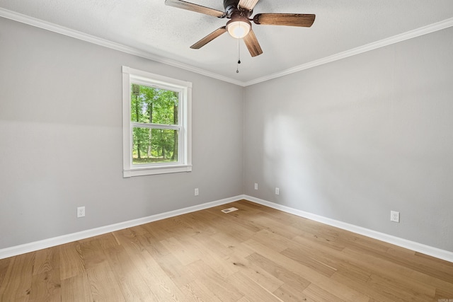 912 Bumpus Rd, Alexander, AR 72002 - unfurnished room featuring light wood-style floors, ornamental molding, baseboards, and a ceiling fan