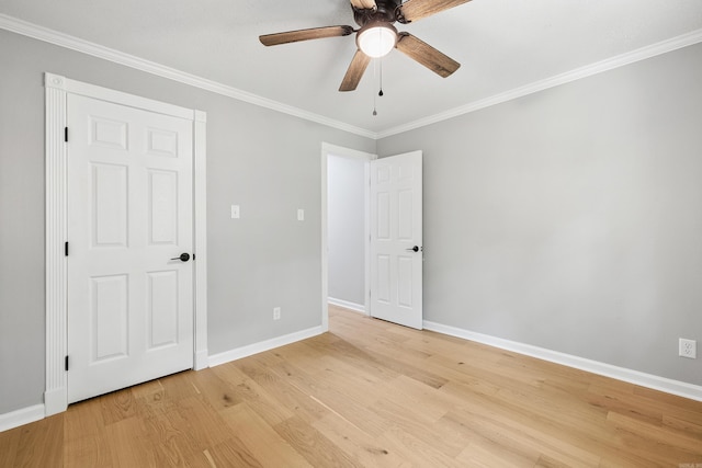 912 Bumpus Rd, Alexander, AR 72002 - unfurnished bedroom featuring baseboards, light wood-style flooring, crown molding, and a ceiling fan