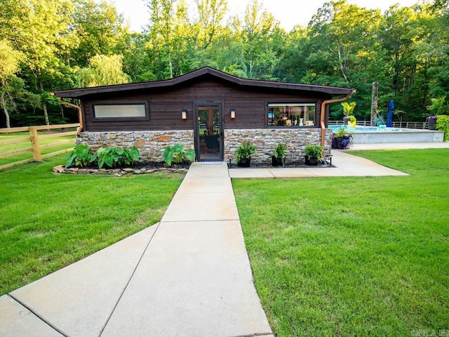 22405 Denny Rd, Little Rock, AR 72223 - view of front of home featuring stone siding and an outdoor pool