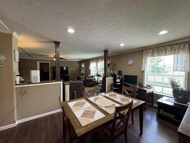 684 Cotter Rd, Gassville, AR 72635 - dining room with a textured ceiling, crown molding, decorative columns, wood finished floors, and baseboards