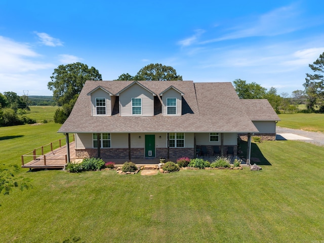118 Caroline Loop, Plumerville, AR 72127 - view of front facade featuring stone siding, a front lawn, a shingled roof, and covered porch