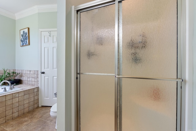 118 Caroline Loop, Plumerville, AR 72127 - bathroom featuring crown molding, a garden tub, a shower stall, toilet, and tile patterned floors