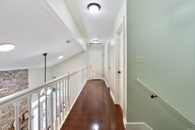 118 Caroline Loop, Plumerville, AR 72127 - hallway with dark wood-type flooring, baseboards, and beamed ceiling