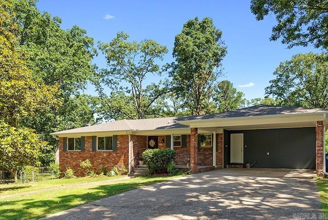 6513 Corsica Dr, North Little Rock, AR 72116 - ranch-style house featuring asphalt driveway, brick siding, and a carport