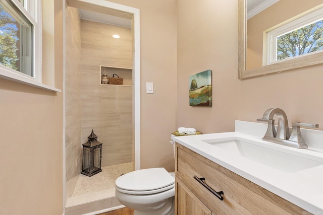 6513 Corsica Dr, North Little Rock, AR 72116 - full bathroom featuring vanity, toilet, and tiled shower