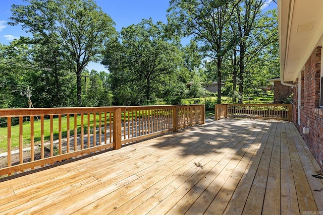 6513 Corsica Dr, North Little Rock, AR 72116 - wooden terrace featuring view of wooded area