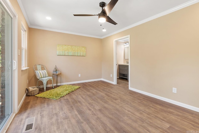 6513 Corsica Dr, North Little Rock, AR 72116 - living area with ceiling fan, crown molding, baseboards, recessed lighting, and wood finished floors