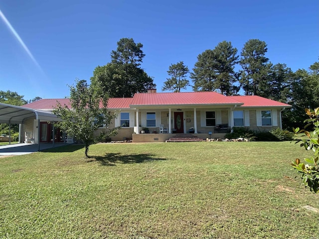 16 Mockingbird Ln, Story, AR 71970 - single story home with a porch, a front yard, a chimney, and metal roof