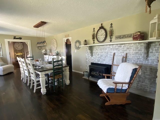 16 Mockingbird Ln, Story, AR 71970 - dining room with wood finished floors and a textured ceiling