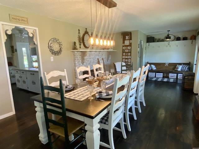 16 Mockingbird Ln, Story, AR 71970 - dining room with dark wood finished floors and a chandelier