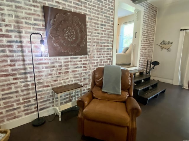 16 Mockingbird Ln, Story, AR 71970 - living area with brick wall and baseboards