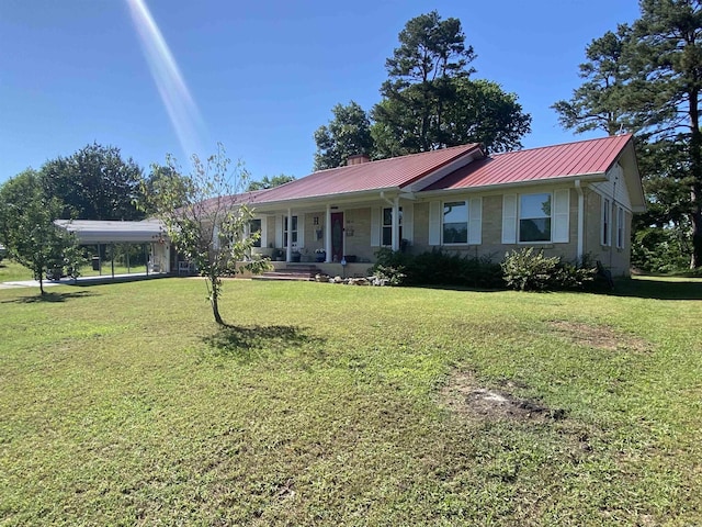 16 Mockingbird Ln, Story, AR 71970 - ranch-style house featuring a porch, a front yard, metal roof, and a carport