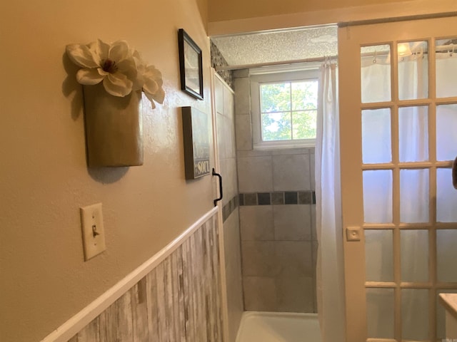 16 Mockingbird Ln, Story, AR 71970 - full bathroom with a stall shower and a textured ceiling