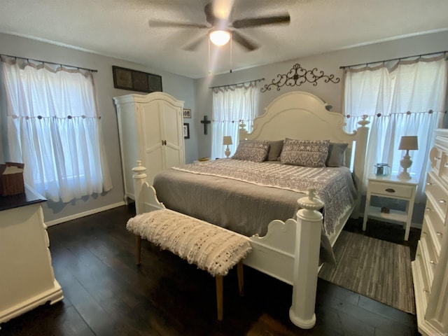 16 Mockingbird Ln, Story, AR 71970 - bedroom featuring dark wood-type flooring, ceiling fan, and a textured ceiling
