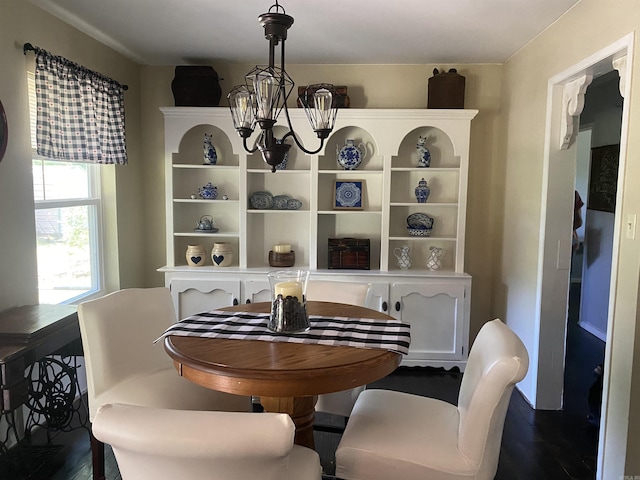 16 Mockingbird Ln, Story, AR 71970 - dining area featuring a chandelier and dark wood finished floors